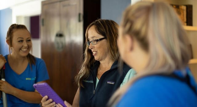 Franchisee cleaners undergoing training from an Ecomaids support staff member.