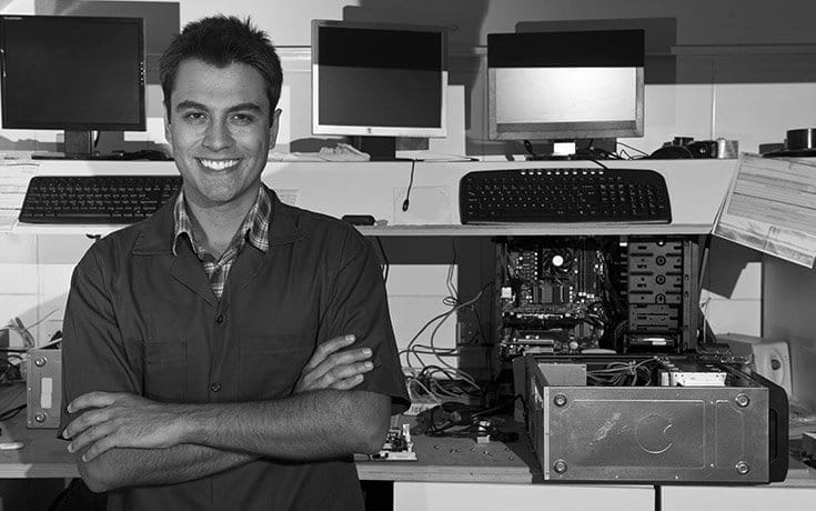 A smiling franchisee preparing to sell his franchise.