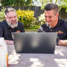 Bar-B-Clean franchisee being trained and supported.