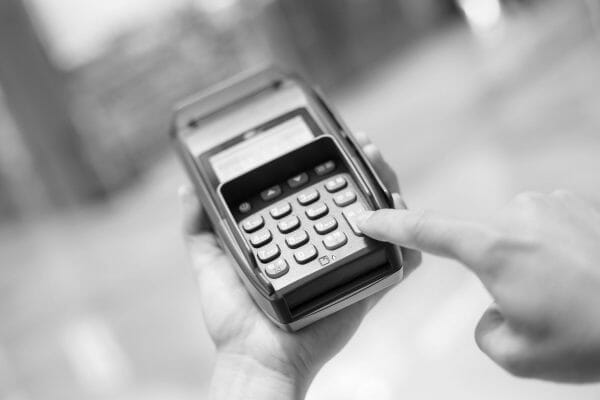 A potential franchisee calculating the cost of buying a franchise resale.