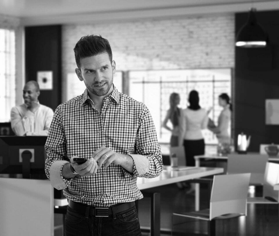 A Franchise owner standing in an office